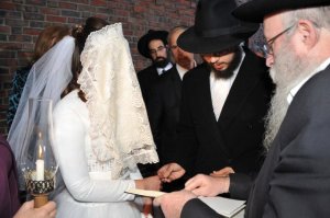 Me getting married at 770, the Rebbe's headquarters, with the Rav who did my conversion and teh rabbi who's class changed my life foreva.